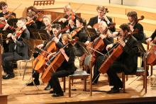 An orchestra performing a concert